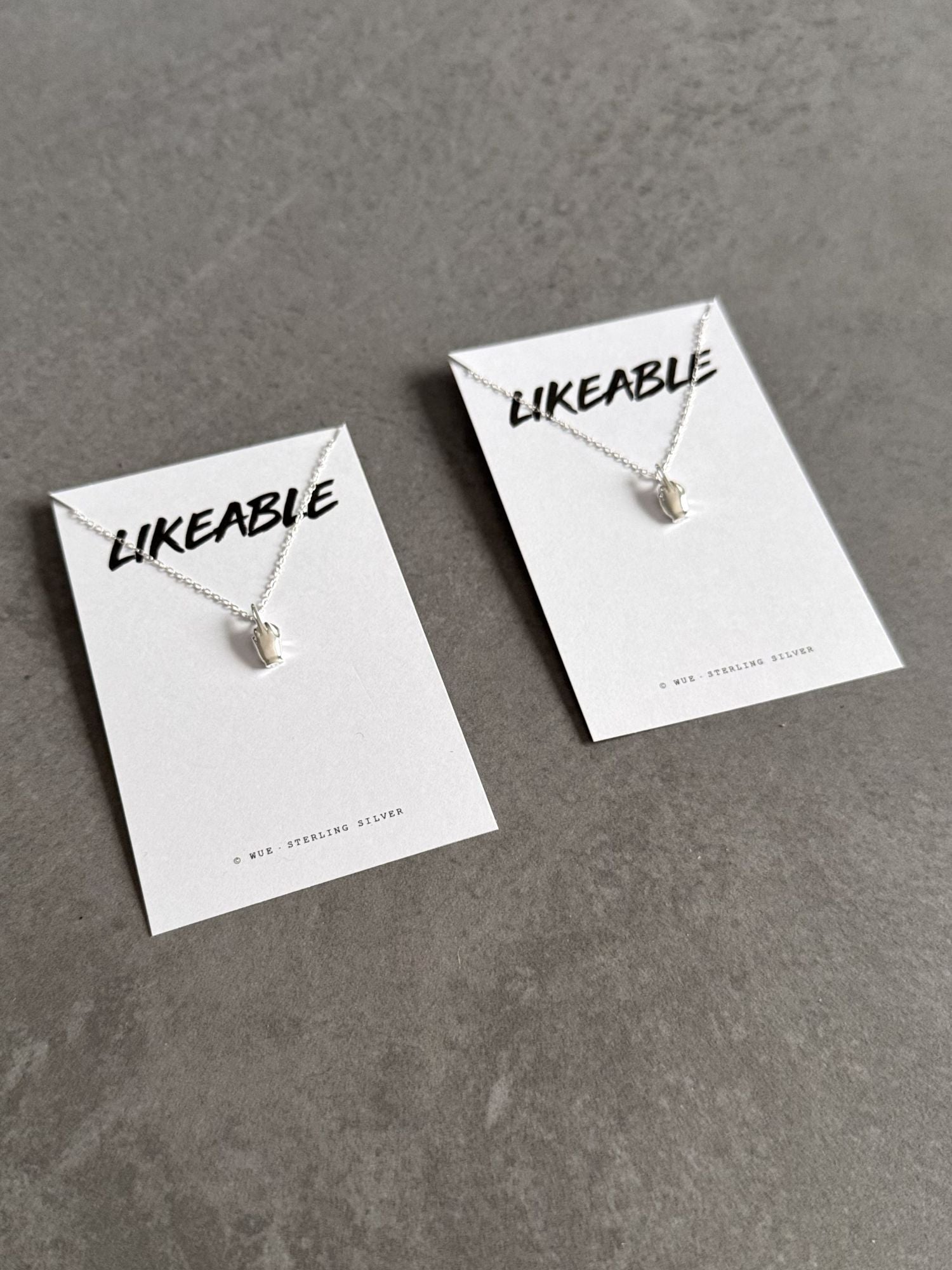 'Likeable' Sterling Silver Middle Finger Necklace