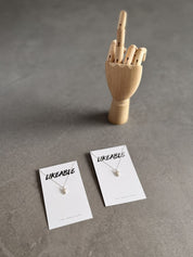 'Likeable' Sterling Silver Middle Finger Necklace