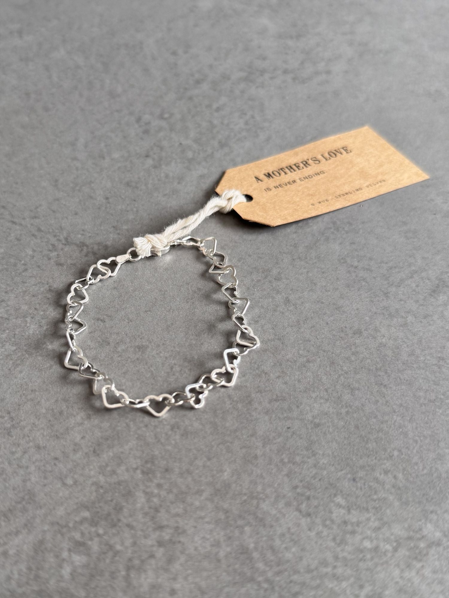 Mother's Love Sterling Silver Linked Hearts Bracelet