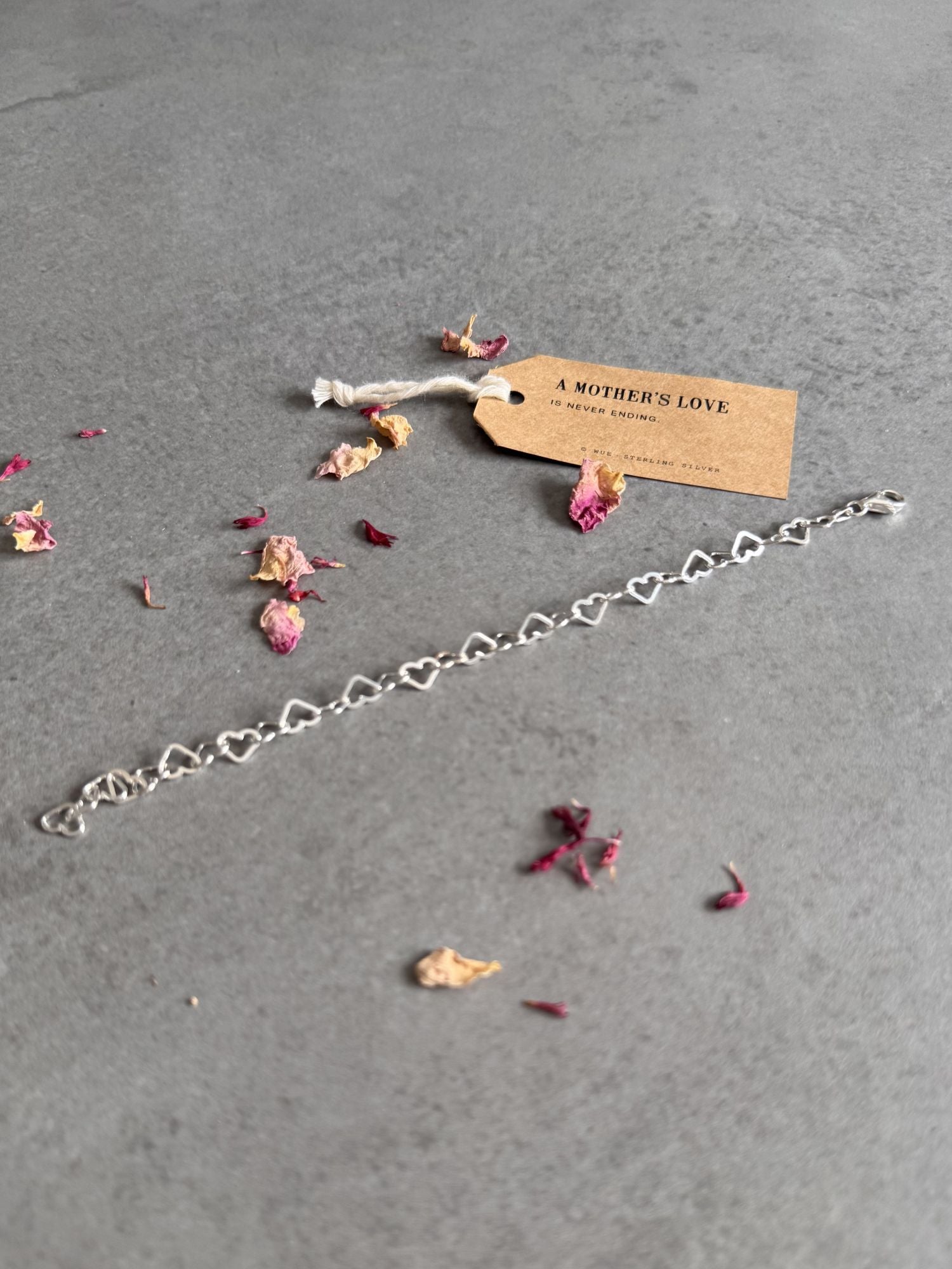 Mother's Love Sterling Silver Linked Hearts Bracelet