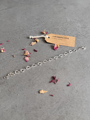 Mother's Love Sterling Silver Linked Hearts Bracelet